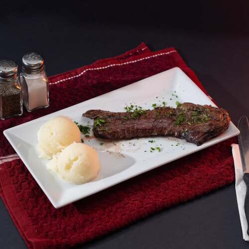                                                                                             Parrillada Argentina Tradicional
Variedad de Cortes Premium
Selección de Vinos
Postres Caseros
Música en Vivo
                                                                                    